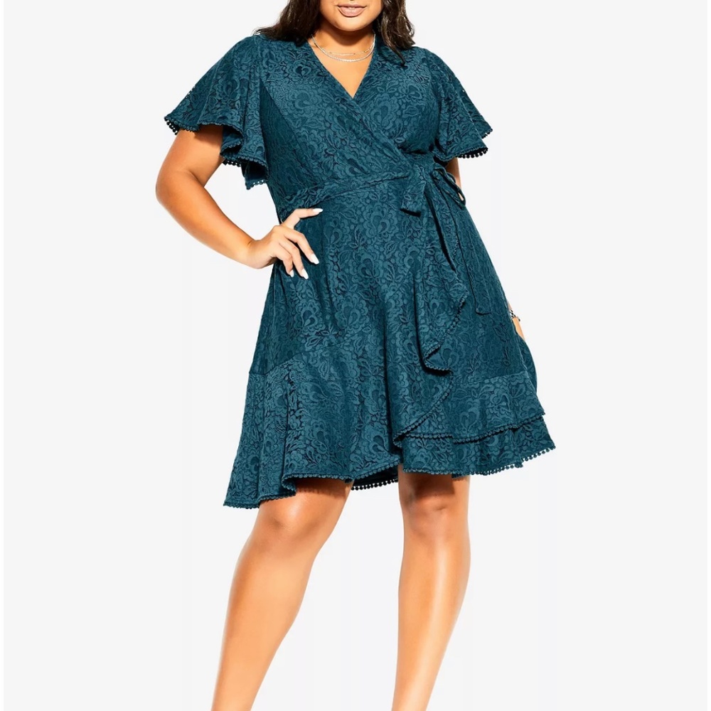 Trendy peacock blue cocktail dress